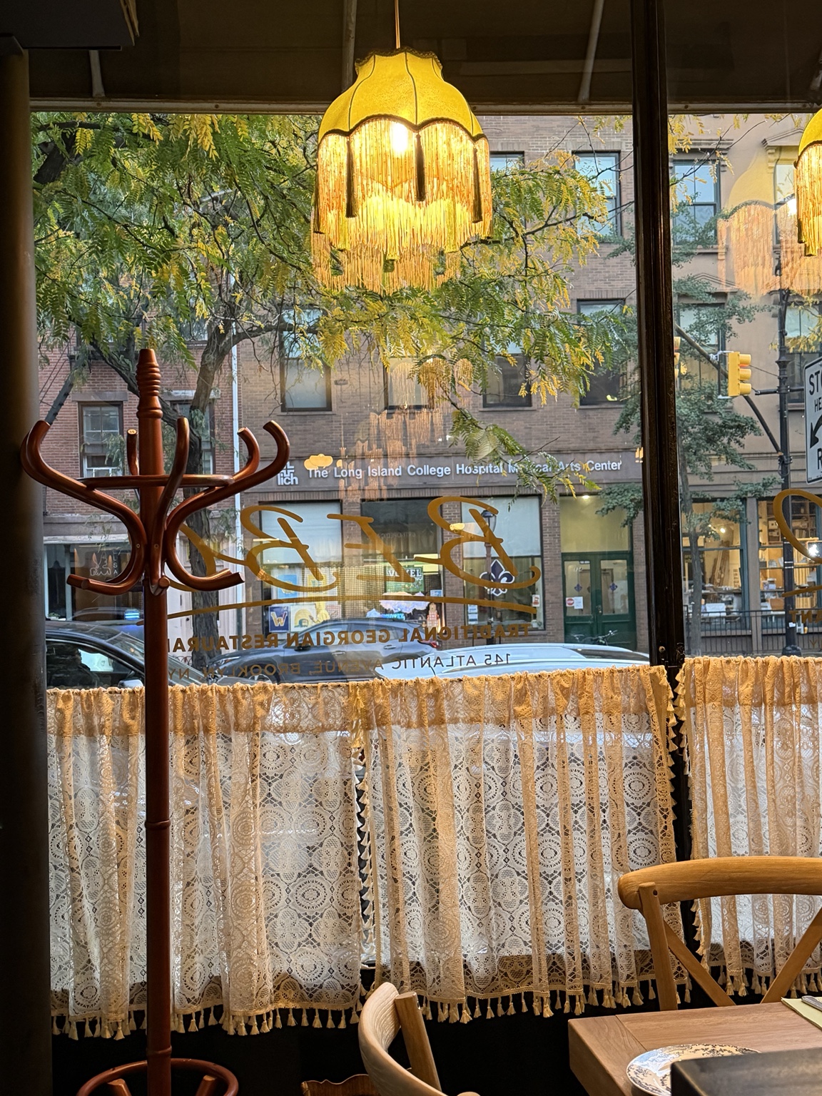 Sunlight through the lace-curtained windows